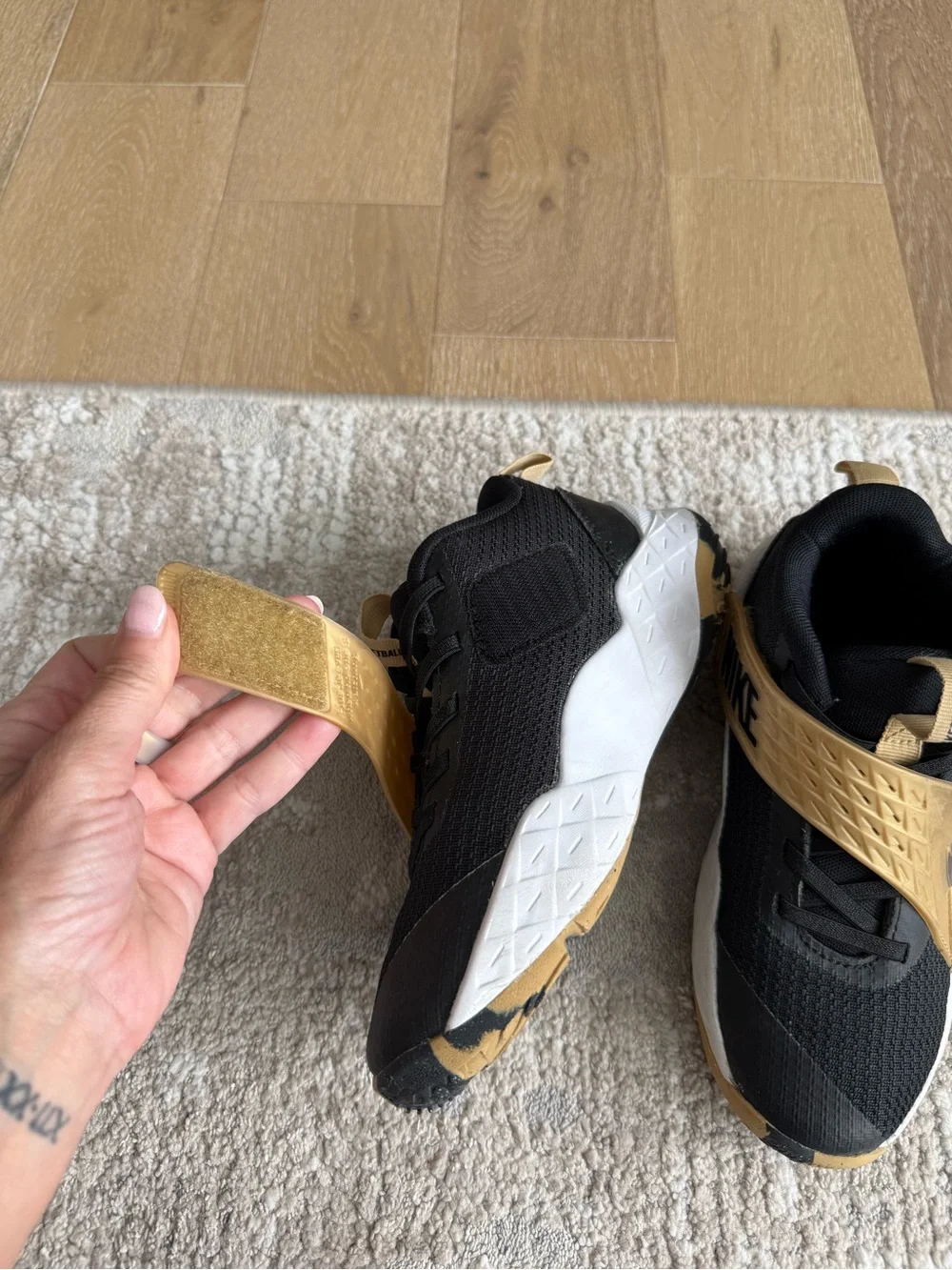 EUC Nike Kids Black and Gold Basketball Shoes